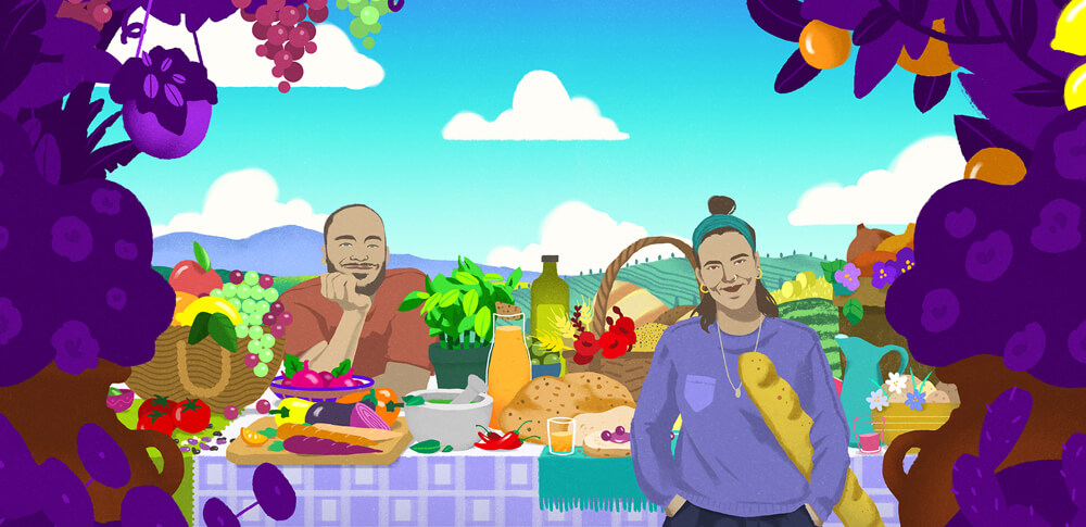Two people stand relaxed around a table full of vegetables, fruits, and flowers. In the distance we see sunny hills